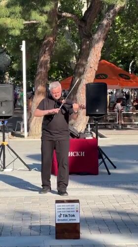 Summer afternoon unfolds along Gelendzhik Bay waterfront promenade