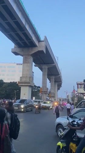Traffic jam slows vehicles beneath unfinished metro overpass in Chennai
