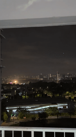 Kuala Lumpur evening scenes and sleeping cat documented