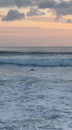 Sunset beach life captured at Kuta Selatan, Indonesia