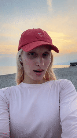 Woman enjoys sunset moment on Alanya beach