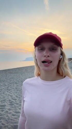 Woman enjoys sunset moment on Alanya beach