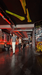 Underground fashion show in a graffiti-lined Milan venue