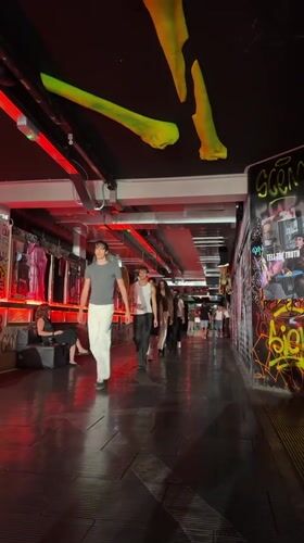 Underground fashion show in a graffiti-lined Milan venue