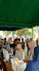 Aid distribution draws crowds in Lhokseumawe, Indonesia