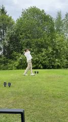 Golfer tees off under overcast skies in Hakadal