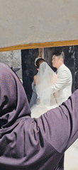Wedding photoshoot captured at stone building in Denpasar
