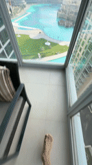 Pre-dawn balcony view of Dubai skyline captured on video