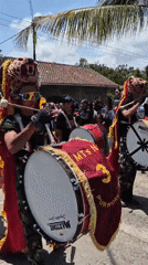 Traditional street parade with decorated horses and marching bands in Grantung