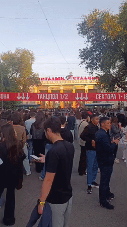 Crowds gather at Almaty Central Stadium for outdoor event