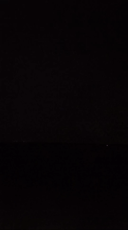Pink glow briefly illuminates horizon over Bangladesh waters