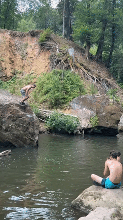 Cliff jumping and swimming at Irrel's rocky river gorge