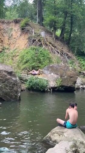 Cliff jumping and swimming at Irrel's rocky river gorge
