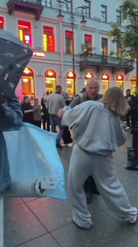 Rainy evening street dancing and live music in Saint Petersburg