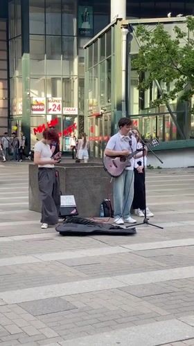 Young musicians perform outdoor concert in Sinyavino plaza