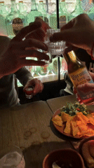 Two men visit Moscow bar with bottle display