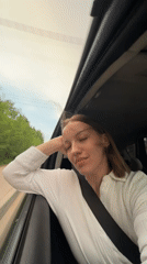 Woman observed in moving car in rural Russia