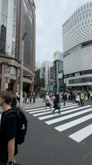 Morning commute scenes documented across central Tokyo districts