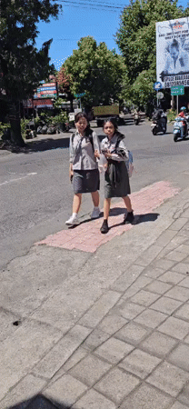 Early morning daily life scenes captured in Denpasar, Indonesia