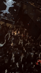 Young adults dance at lively Tbilisi nightclub venue