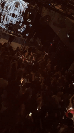 Young adults dance at lively Tbilisi nightclub venue