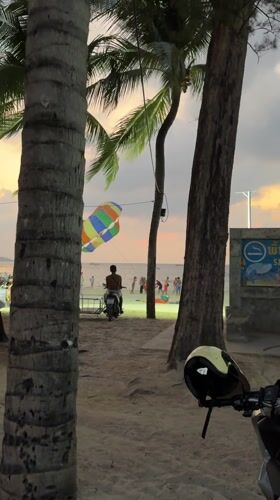 Evening beach life captured in Patong, Thailand