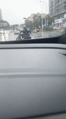 Rainy drive through Luohu's urban streets, one detour inside.