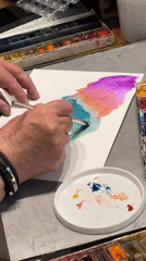 Artist creates watercolor paintings during casual gathering in Tbilisi