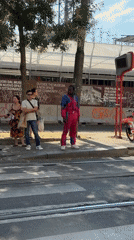 Milan morning: tram stop street scene and a salon selfie