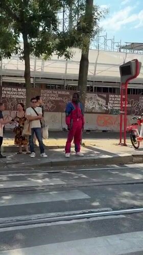 Milan morning: tram stop street scene and a salon selfie