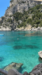 Tourist captures morning scenes exploring Capri's coastline and attractions