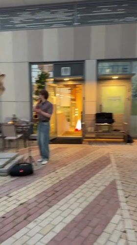 Saxophone on the patio, park paths at dusk, Moscow evening