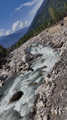 Mountain town life in Vashisht amid Himalayan rivers and peaks