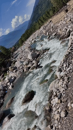 Mountain town life in Vashisht amid Himalayan rivers and peaks