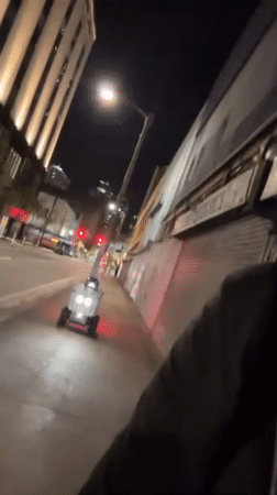 Delivery robot spotted on Miami sidewalk at night