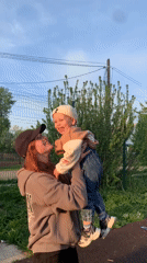 Families enjoy afternoon playground time in Фоки, Russia