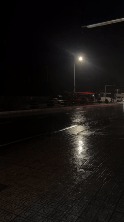 Evening rainstorm, street life documented in Nha Trang ward