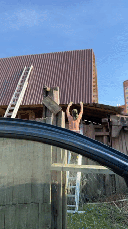 Roof repair work documented in residential Perm, Russia