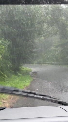 Heavy Rain Obscures Mountain Road Travel in Baturiti