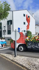 Decorated volcano float highlights festive parade in Ribeira Grande
