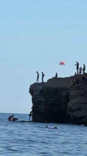 Cliff jumping and paddleboarding off the Budva coastline
