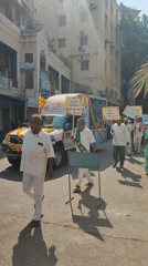 Mobile health display procession moves through Puttaparthi streets