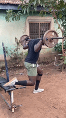 Man completes morning backyard workout routine in Akwanga, Nigeria