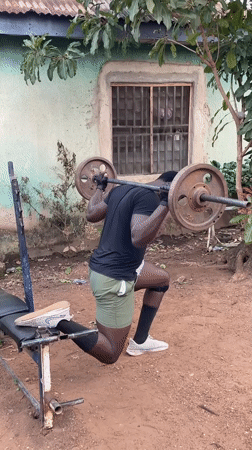 Man completes morning backyard workout routine in Akwanga, Nigeria
