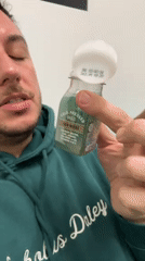 Couple takes health shots during rainy London afternoon