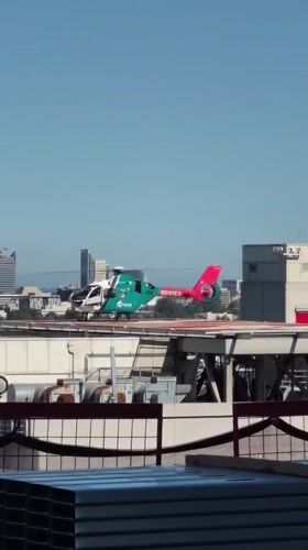 Medical helicopter hovers over Sacramento rooftop helipad