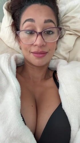 Woman recorded making playful expressions in bed in Los Angeles