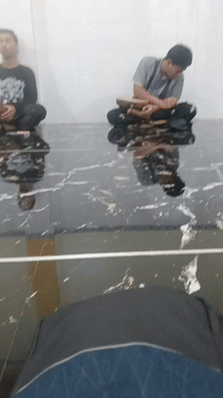 Frame drum session on a reflective floor in Surabaya