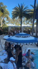 Pool party with pink decorations at Miami Beach luxury hotel
