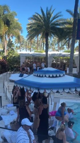 Pool party with pink decorations at Miami Beach luxury hotel
